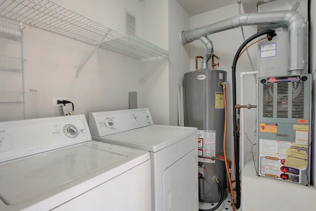 a view of a balcony with two chairs