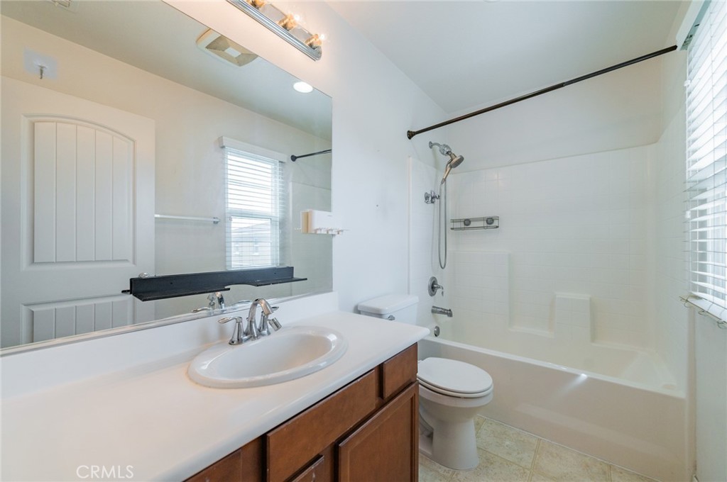 9361 Culinary Rancho Cucamonga, CA 91730 - Photo 13 of 45 a bathroom with a sink a toilet and shower