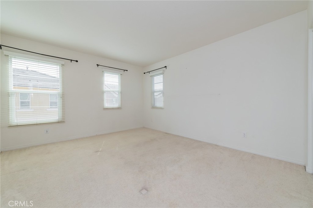 9361 Culinary Rancho Cucamonga, CA 91730 - Photo 15 of 45 an empty room with windows