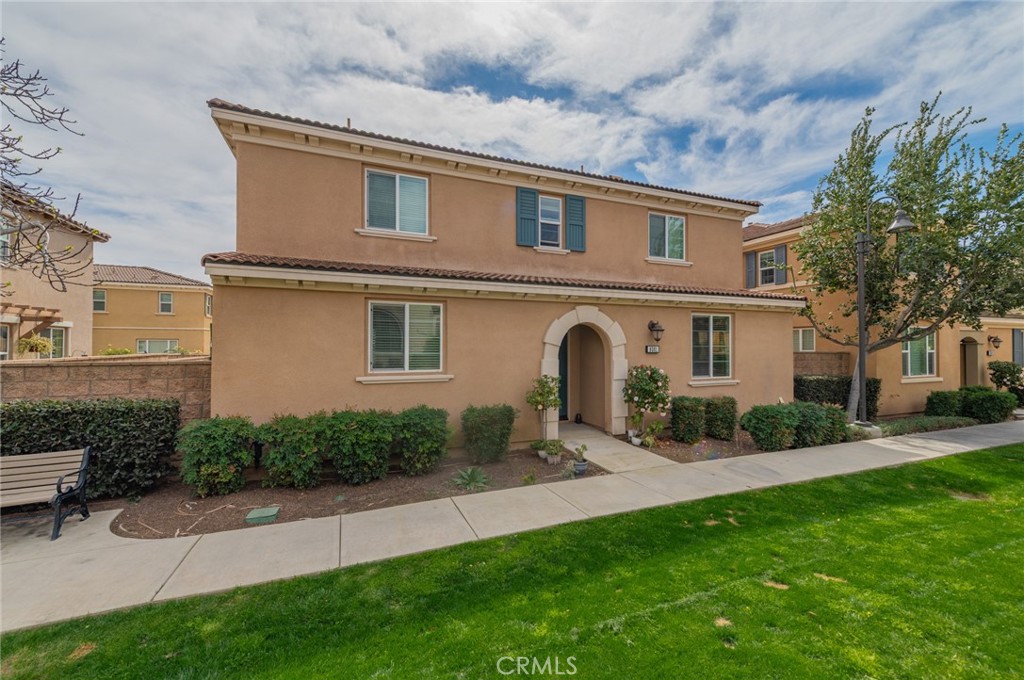 9361 Culinary Rancho Cucamonga, CA 91730 - Photo 2 of 45 a front view of a house with a garden and plants