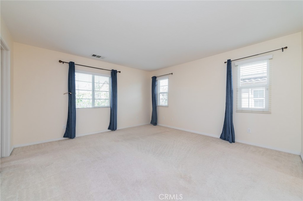 9361 Culinary Rancho Cucamonga, CA 91730 - Photo 28 of 45 an empty room with windows