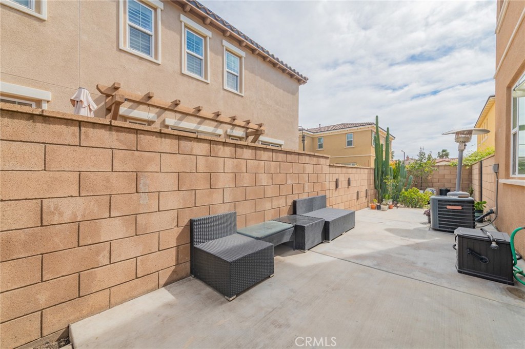9361 Culinary Rancho Cucamonga, CA 91730 - Photo 32 of 45 a view of a terrace with seating area