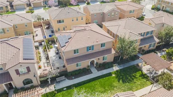 an aerial view of a house with garden