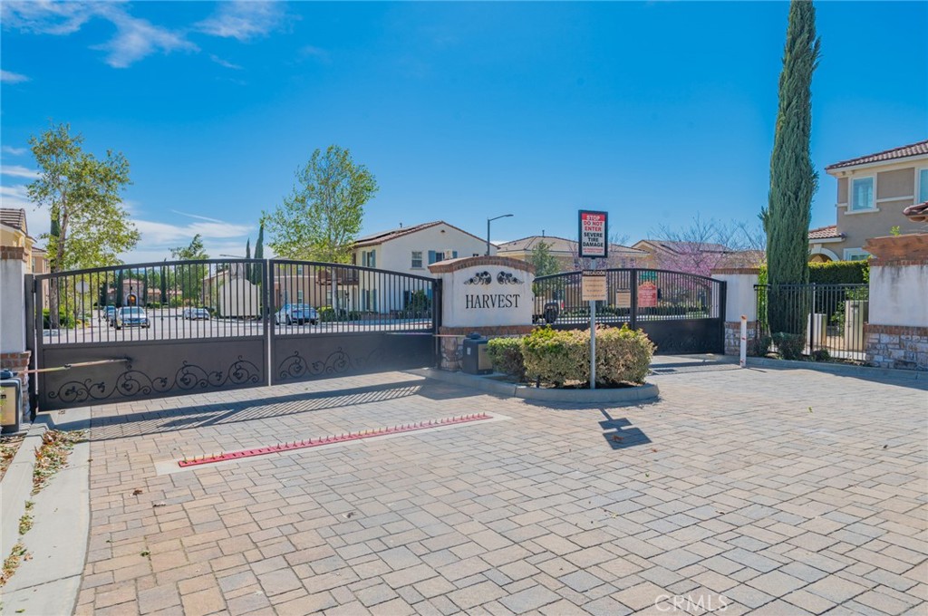 9361 Culinary Rancho Cucamonga, CA 91730 - Photo 41 of 45 a front view of a house with a yard