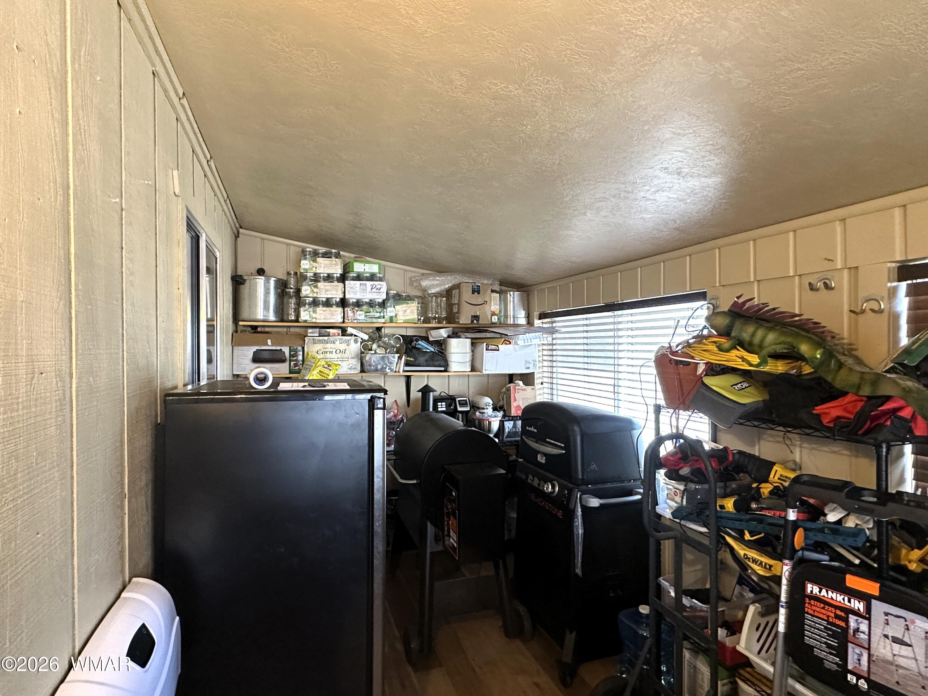 19 County Road Alpine, AZ 85920 - Photo 17 of 27 a kitchen with lots of appliances