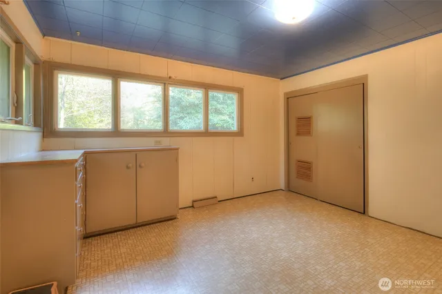 a bathroom with a bathtub and shower
