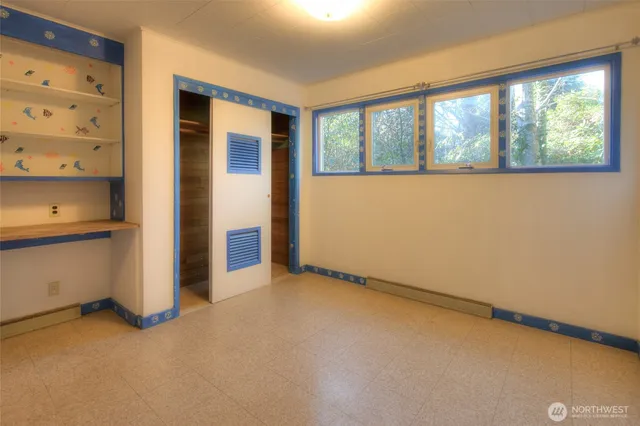 a view of a livingroom with a furniture