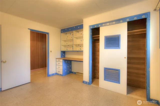 a view of a bathroom with tub