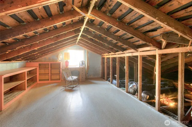 a view of a livingroom with furniture and a flat screen tv