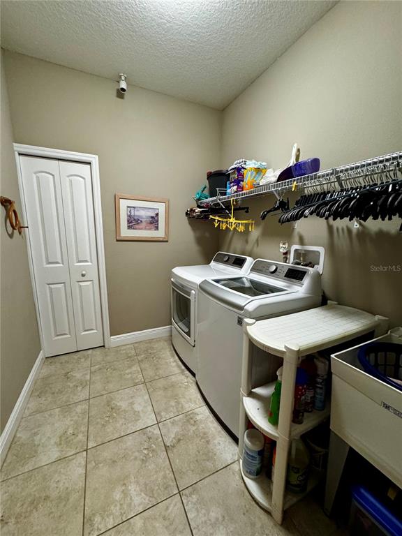 12419 Betony Court New Port Richey, FL 34654 - Photo 18 of 24 a room with storage and utility