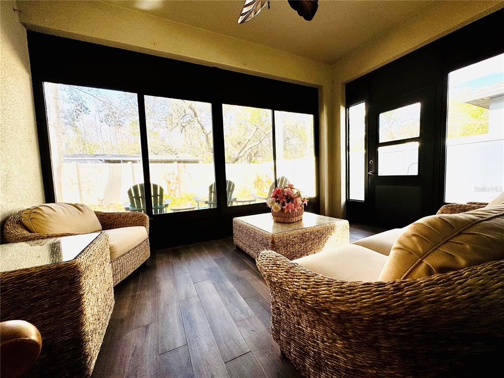 12419 Betony Court New Port Richey, FL 34654 - Photo 19 of 24 a living room with furniture and a large window