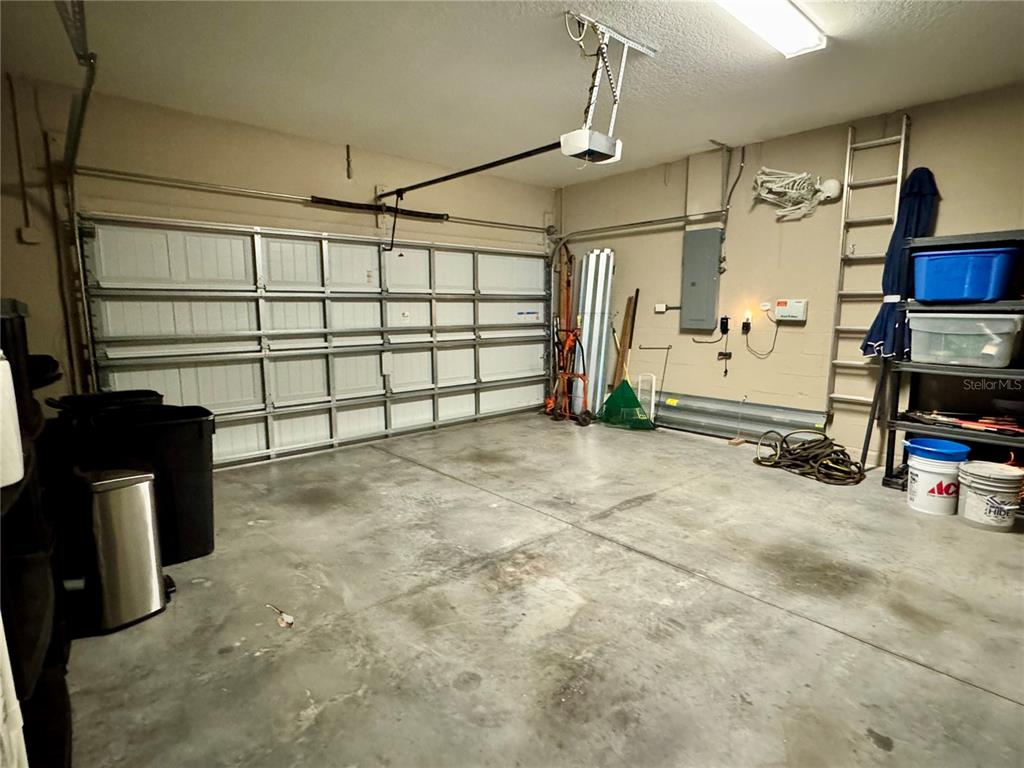 12419 Betony Court New Port Richey, FL 34654 - Photo 21 of 24 a view of a garage