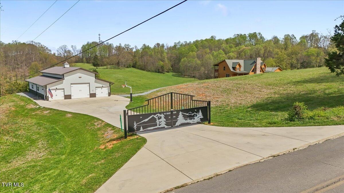 460 Lowell Jones Road Piney Flats, TN 37686 - Photo 2 of 91 82-DJI_20260406151332_0235_D