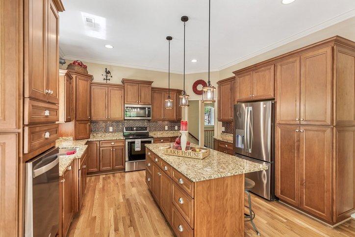 402 Boaters Row Fair Play, SC 29643 - Photo 16 of 50 This spacious kitchen offers a large island, generous counter space, and modern appliances.