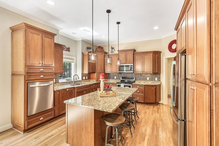402 Boaters Row Fair Play, SC 29643 - Photo 17 of 50 This spacious kitchen offers a central island, ample cabinetry, and modern stainless steel appliances.