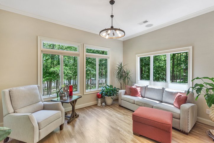 402 Boaters Row Fair Play, SC 29643 - Photo 21 of 50 Bright and airy living room offers expansive windows with peaceful views.