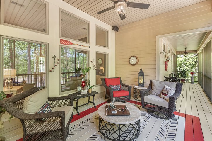 402 Boaters Row Fair Play, SC 29643 - Photo 23 of 50 An inviting screened porch extends living space, offering comfort and outdoor enjoyment.