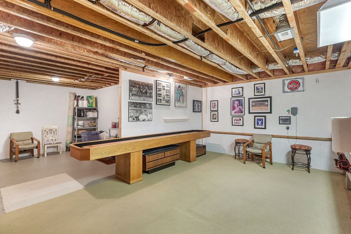 402 Boaters Row Fair Play, SC 29643 - Photo 32 of 50 This spacious basement offers an unfinished ceiling with exposed beams, perfect for recreation.