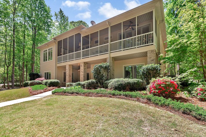 402 Boaters Row Fair Play, SC 29643 - Photo 40 of 50 This residence features spacious screened porches and lush landscaping.