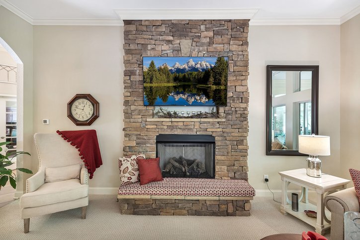 402 Boaters Row Fair Play, SC 29643 - Photo 4 of 50 This inviting living space features a captivating stone fireplace, ideal for intimate gatherings.