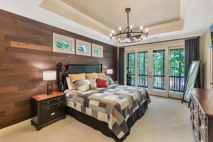 402 Boaters Row Fair Play, SC 29643 - Photo 9 of 50 This tranquil bedroom features outdoor access, creating a peaceful retreat.