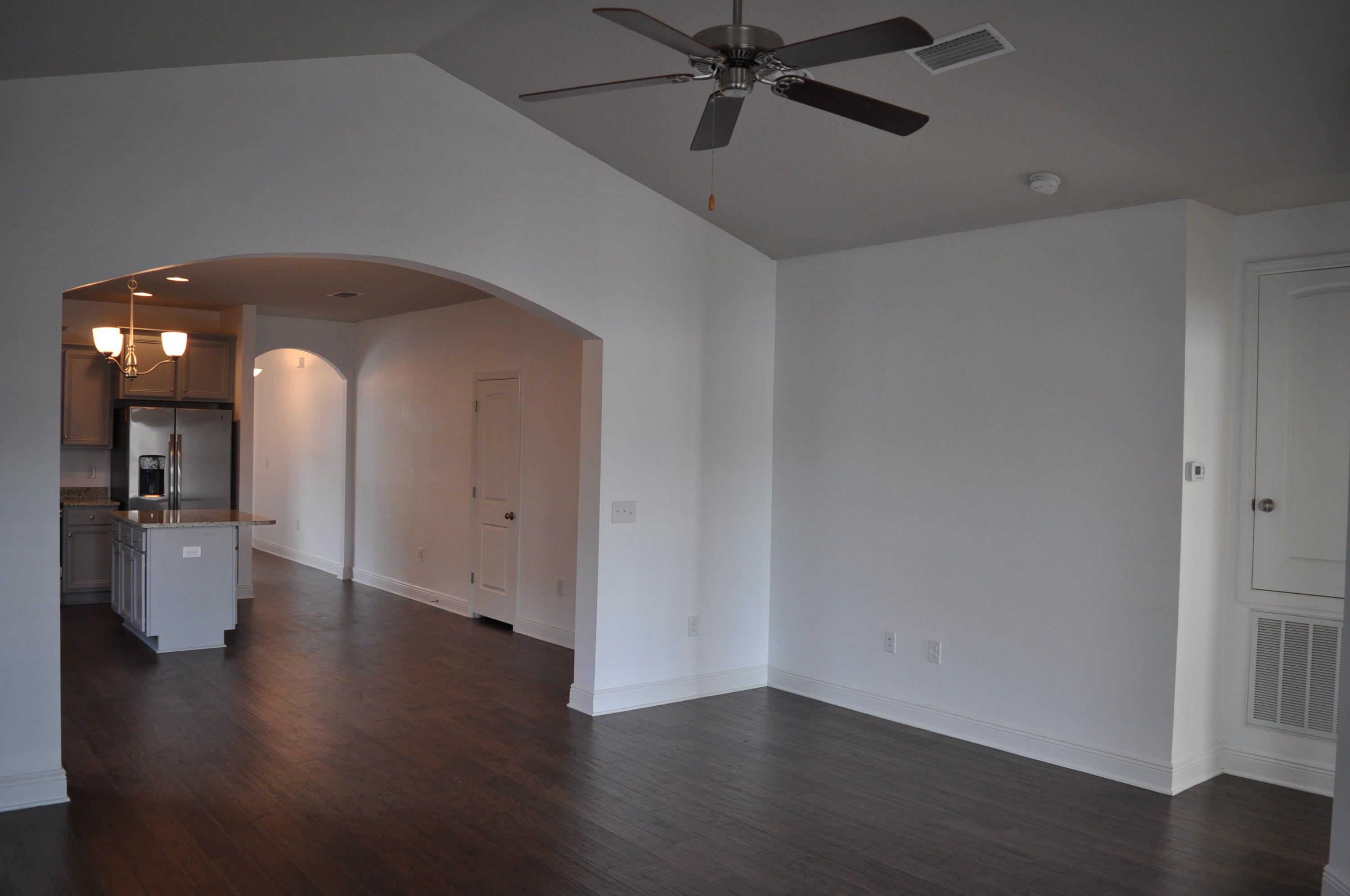 493 Cocobolo Drive Santa Rosa Beach, FL 32459 - Photo 12 of 18 a view of an empty room and wooden floor