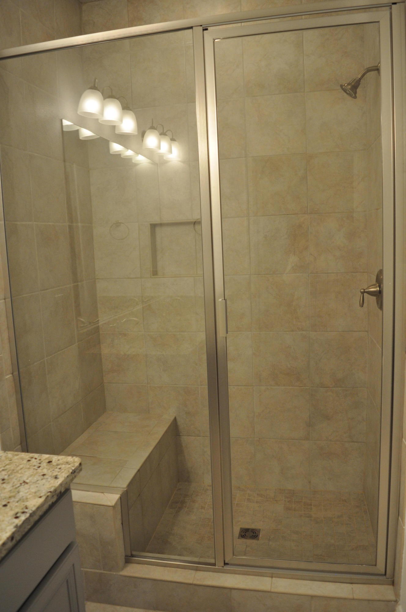 493 Cocobolo Drive Santa Rosa Beach, FL 32459 - Photo 17 of 18 a bathroom with a granite countertop shower and a sink