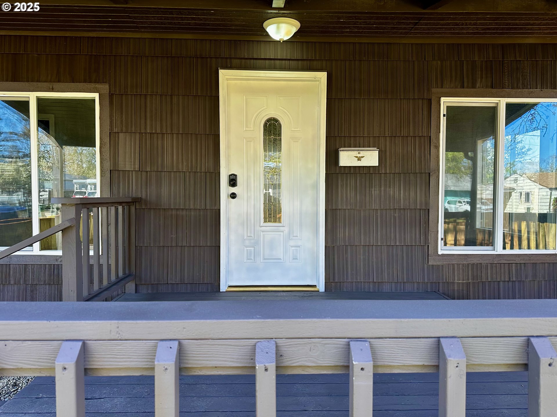 1733 I Street Springfield, OR 97477 - Photo 12 of 28 a view of a windows and a potted plant in front of a door