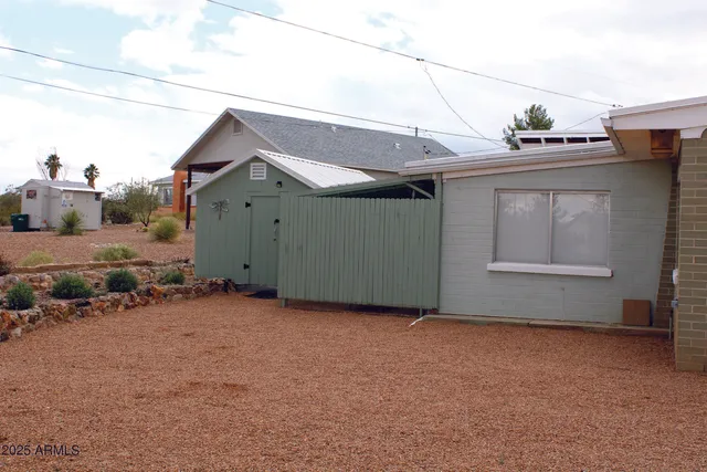 a kitchen with stainless steel appliances a stove and a microwave
