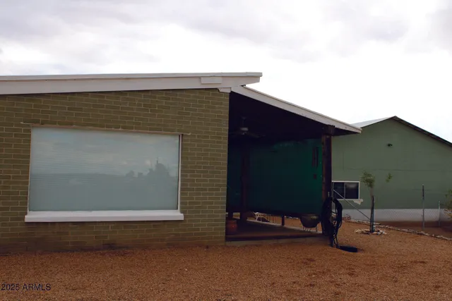 a kitchen with a refrigerator and a sink