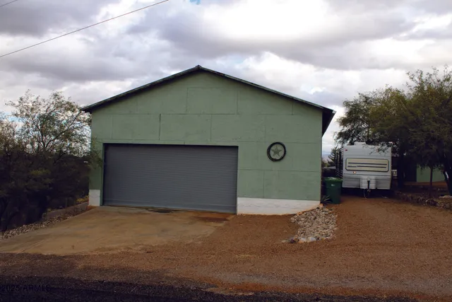 a house with yard and entertaining space