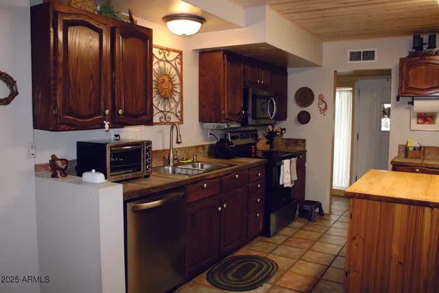 a living room with furniture and window