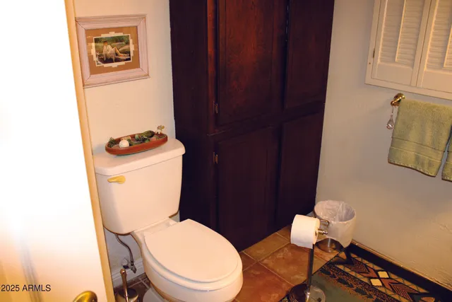 a kitchen with a stove and a refrigerator