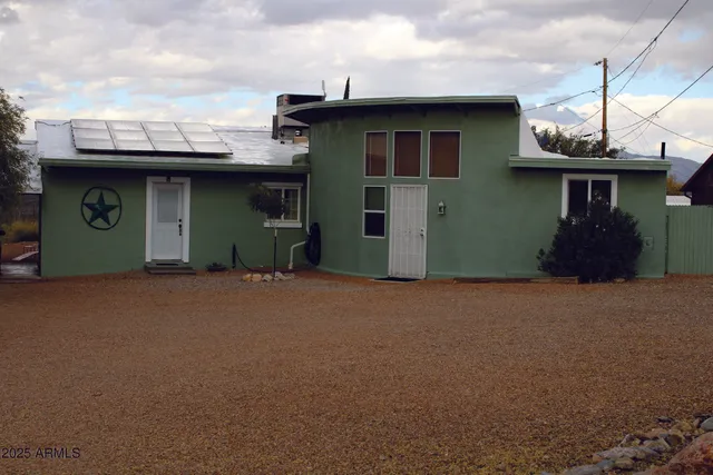 a view of a house with a garage