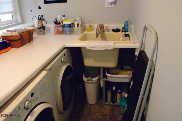 an aerial view of house with yard