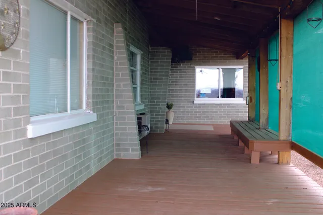 a view of a car parked in front of a house