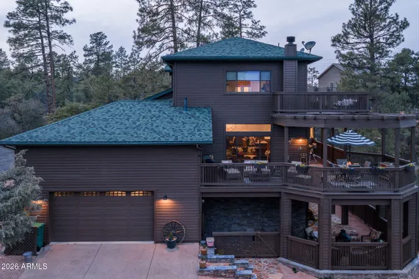 a front view of a house with garage