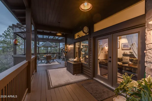 a view of a patio with a table and chairs