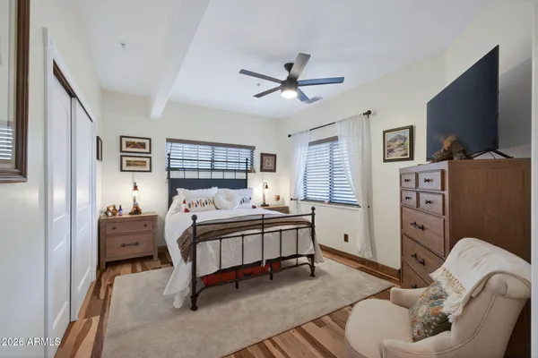 a bedroom with a bed furniture and a window