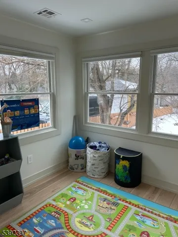 a room with furniture and a window