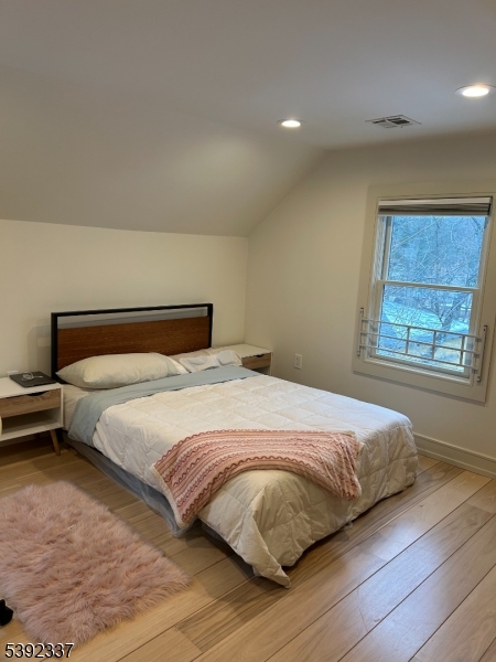 57 Baltusrol Road Summit, NJ 07901 - Photo 15 of 30 a bedroom with a bed and window