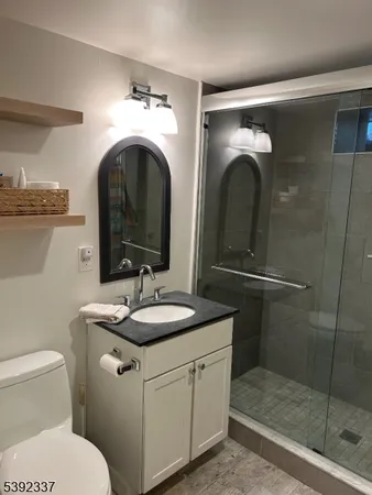 a bathroom with a sink and mirror