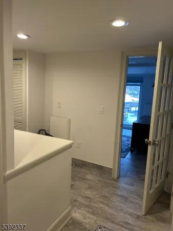 a view of livingroom with washer and dryer