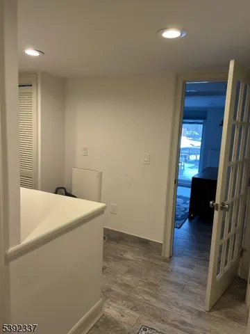 a view of livingroom with washer and dryer