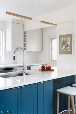 a kitchen with a sink and a cabinets