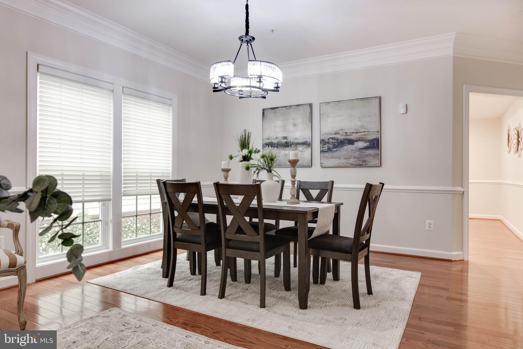 2610 Legends Way Ellicott City, MD 21042 - Photo 15 of 53 a view of a dining room with furniture window and wooden floor