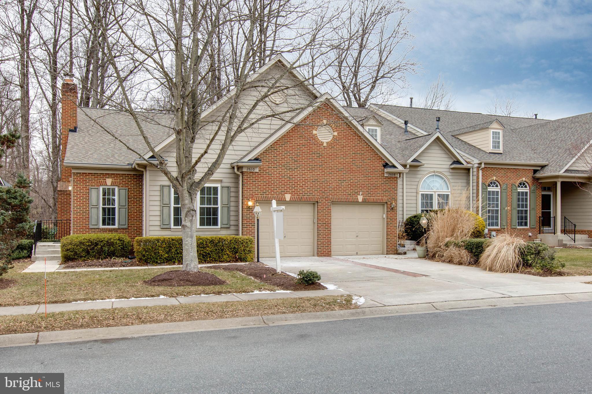 2610 Legends Way Ellicott City, MD 21042 - Photo 2 of 53 a front view of a house with a yard