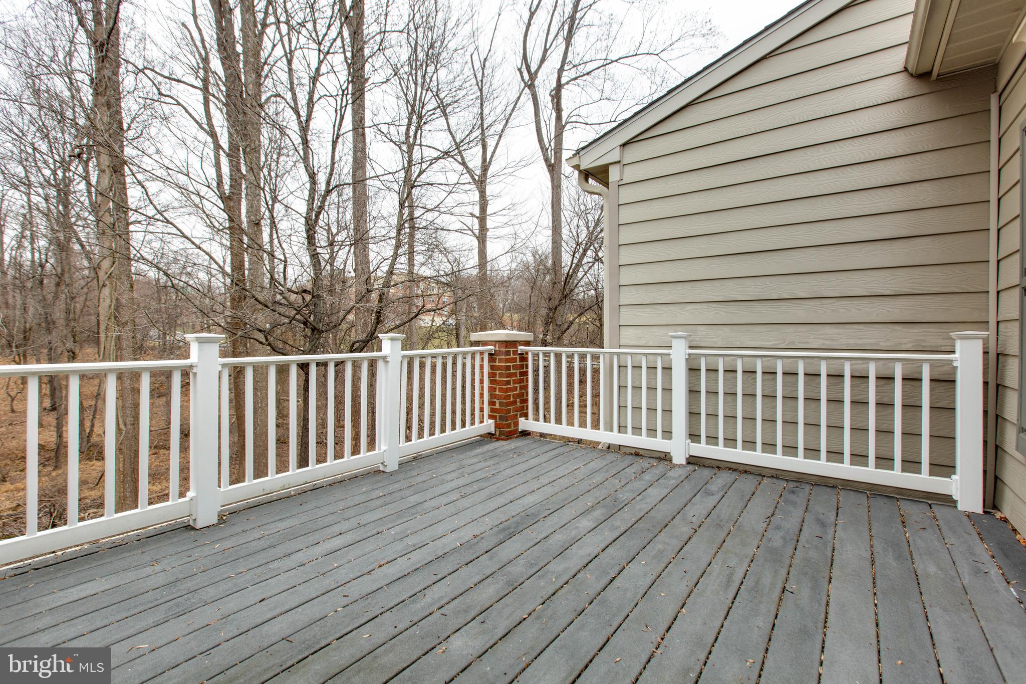 2610 Legends Way Ellicott City, MD 21042 - Photo 33 of 53 a view of a wooden roof with wooden floor and fence