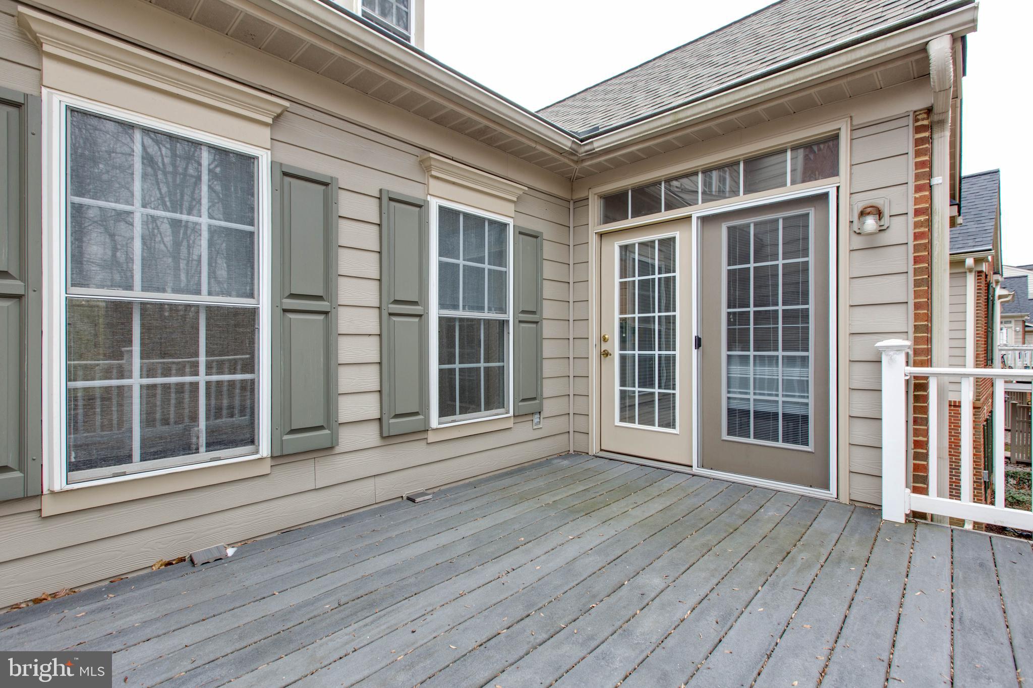 2610 Legends Way Ellicott City, MD 21042 - Photo 35 of 53 a view of house with deck and windows