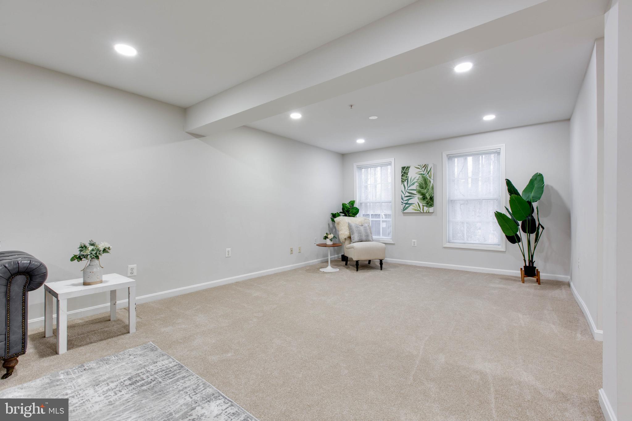 2610 Legends Way Ellicott City, MD 21042 - Photo 41 of 53 a living room with furniture and a potted plant